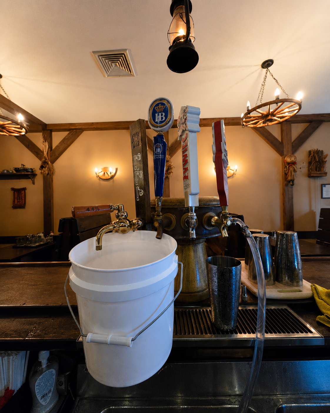 Draft beer taps being serviced at a bar